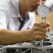 Hand mechanic using Bore gauge (Measurement Tool) Checking cylinder in Engine block .Repair car in workshop